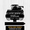 263 Black metal memorial sign with combine harvester silhouette reading "In Loving Memory of William 1960 - 2025" on a white wood background