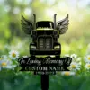 Black silhouette memorial sign of a winged semi truck with daisies and blurred green bokeh background, text area reading "In Loving Memory Of" and placeholder "CUSTOM NAME 1969-2023"