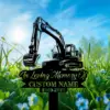 Yard memorial sign shaped like a black excavator silhouette reading "In Loving Memory Of" with placeholder "CUSTOM NAME" and dates over green grass and blue sky