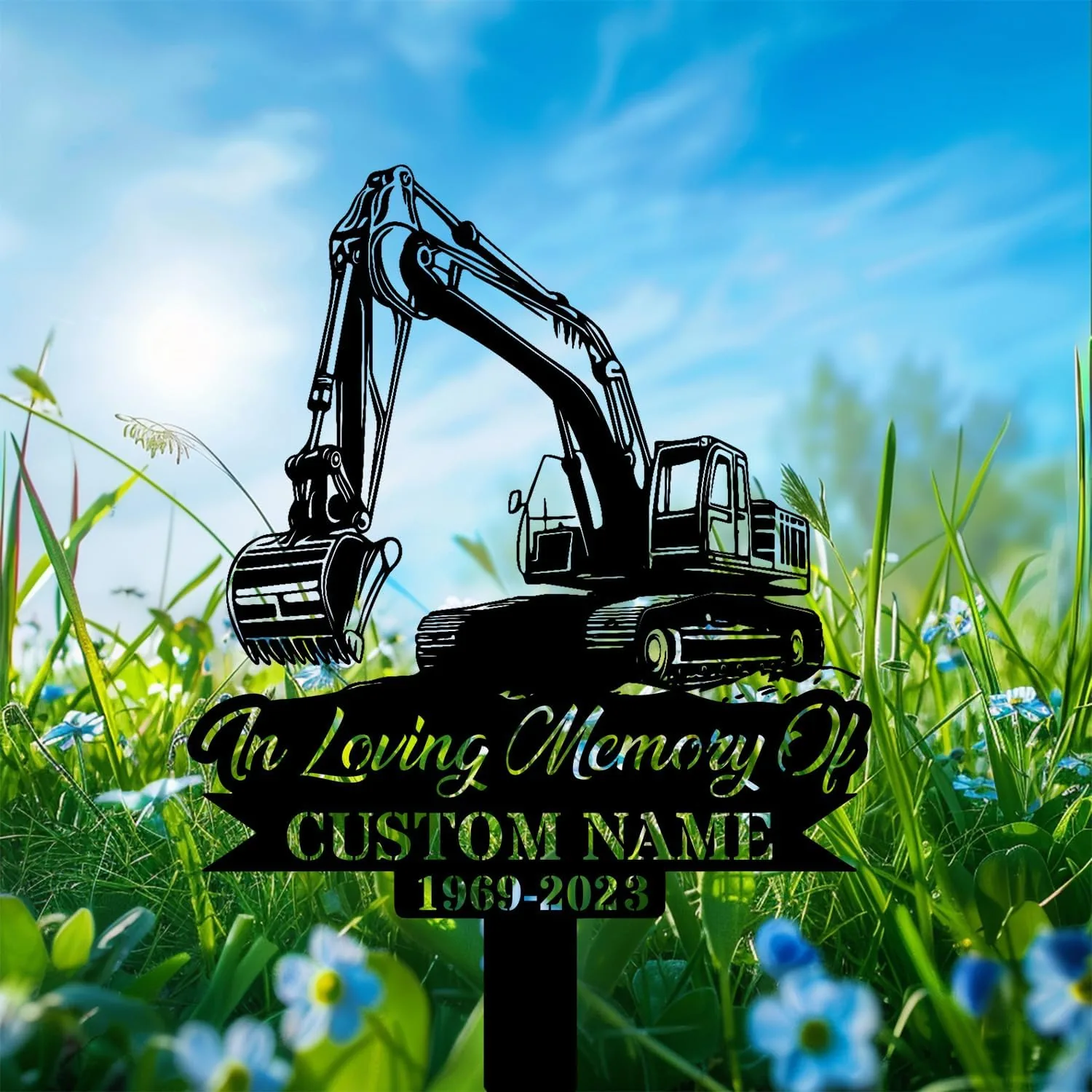 Yard memorial sign shaped like a black excavator silhouette reading "In Loving Memory Of" with placeholder "CUSTOM NAME" and dates over green grass and blue sky