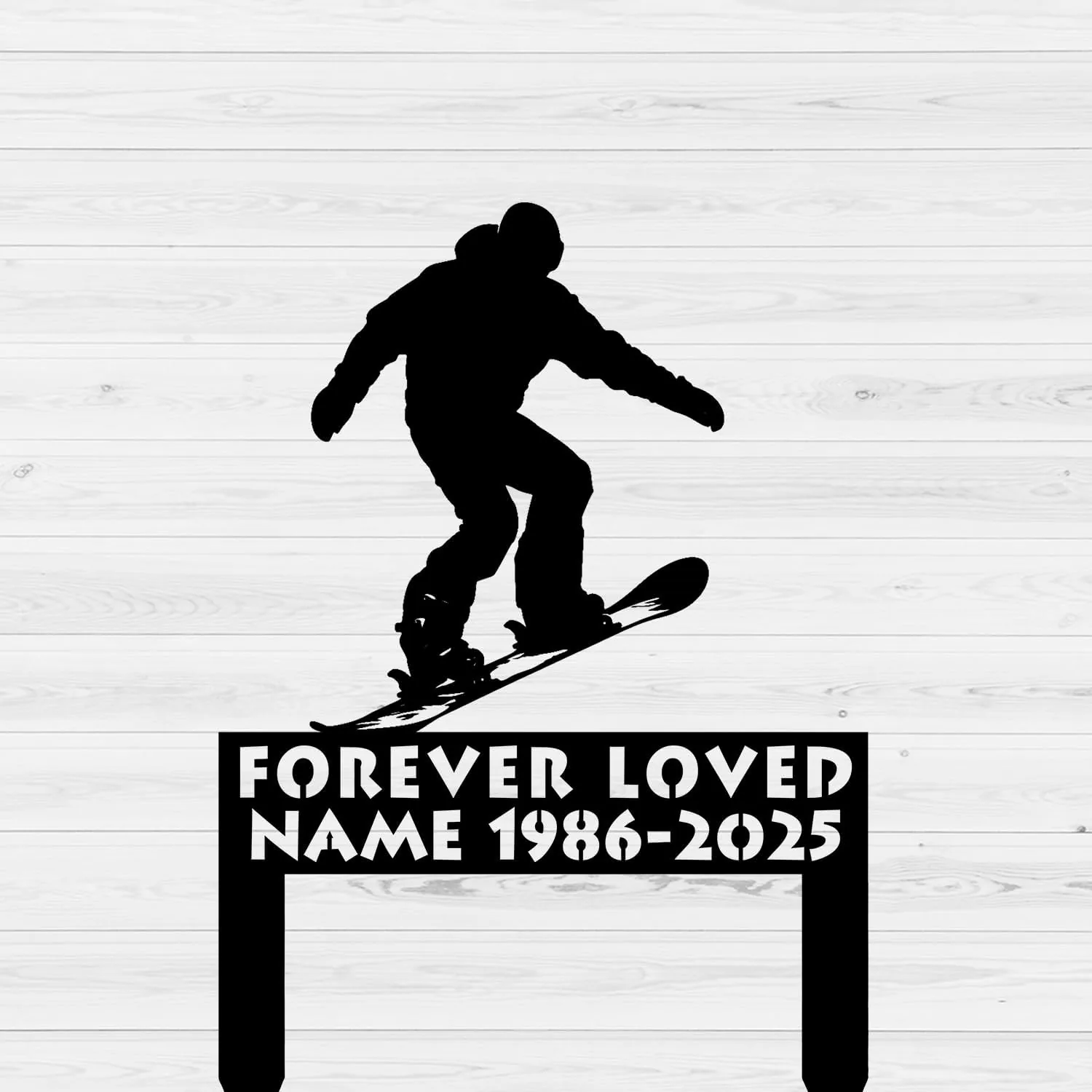 Black silhouette of a snowboarder jumping above a memorial plaque reading "FOREVER LOVED NAME 1986-2025" on a light wood plank background