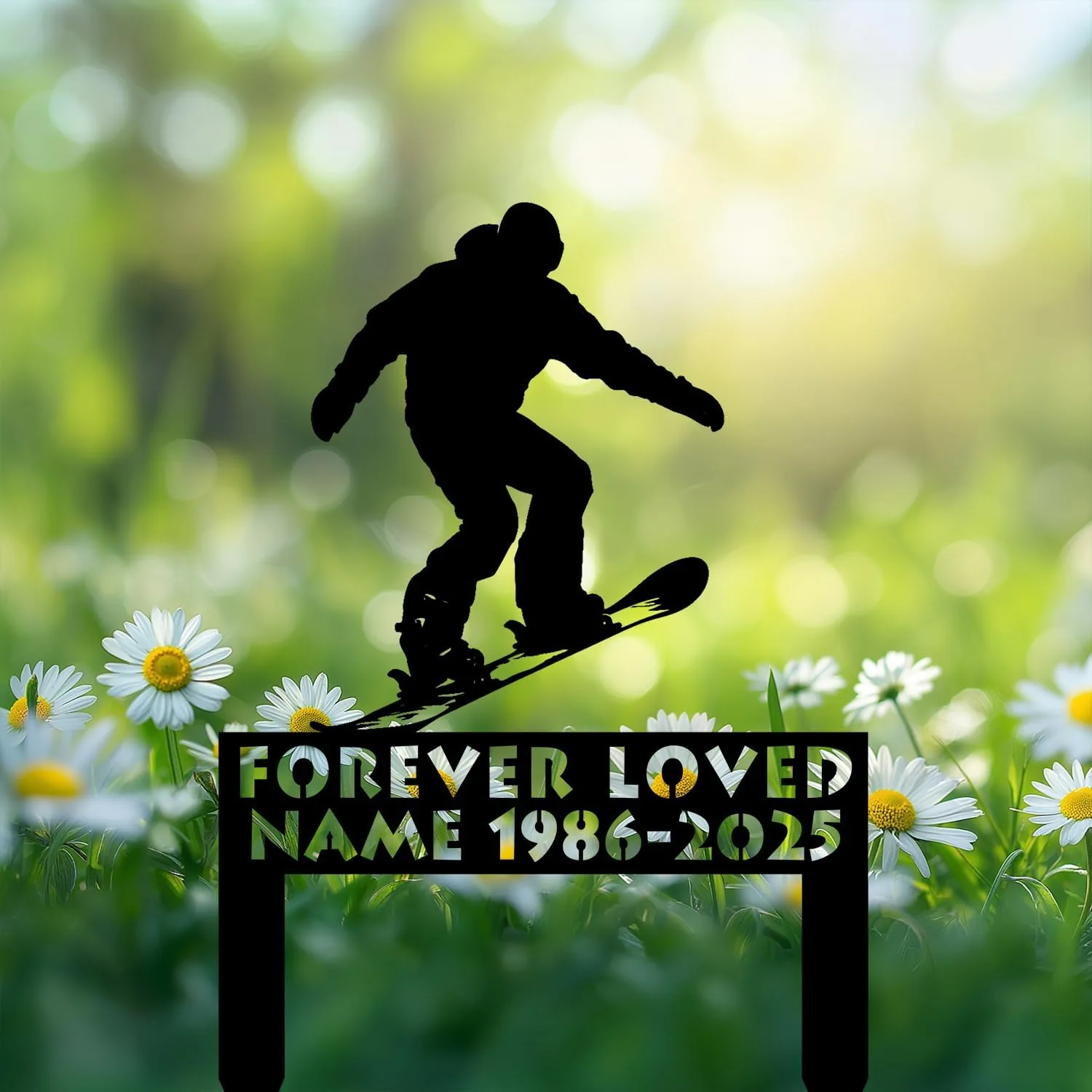 Black silhouette of a snowboarder above daisies with a decorative memorial sign reading "FOREVER LOVED NAME 1986-2025" against a soft green bokeh background