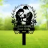 344 Black memorial yard sign showing a silhouetted couple holding an angel-winged baby with text "In Loving Memory of Bean Baby 2025" against a blurred green lawn background