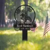352 Memorial yard sign in grass with American flags, black silhouette of motocross rider and checkered flags and text “In Loving Memory of Jacob Henderson 1956 - 2024”