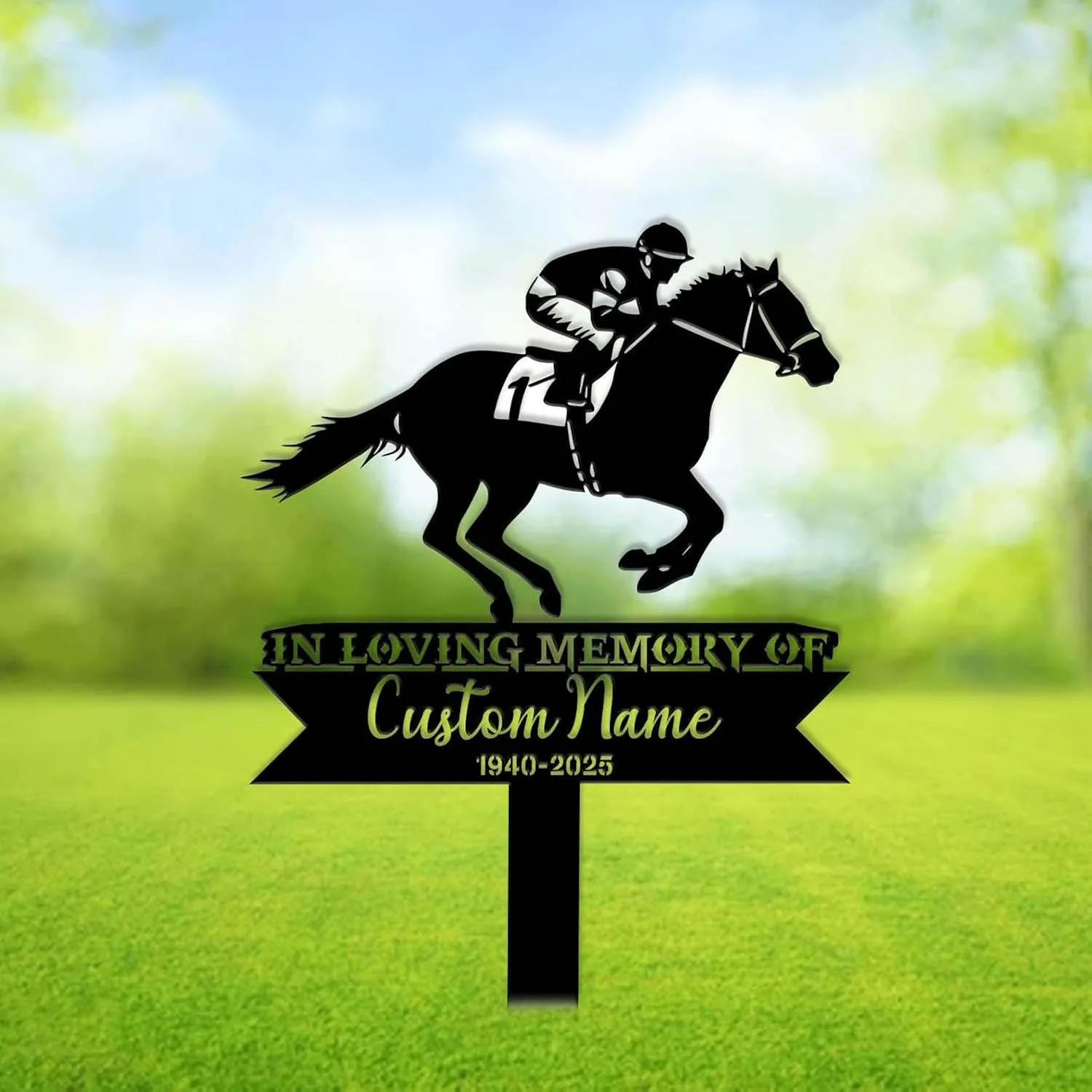 Black metal memorial yard sign with a jockey on a racing horse above text reading "In Loving Memory of" and customizable name and dates, placed in a green lawn