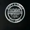 Silver circular metal sign reading "Matt & Emily" at top, floral motif and large name "Anderson" with "50 Years Together" in the center and "EST 2024" at bottom on a dark background