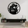 style-18.-Samurai-Geisha-1 Black circular wall art of a samurai and geisha embracing, hung above a modern floating shelf in a minimalist living room