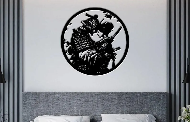 Black circular metal wall art above a bed showing a silhouetted samurai couple with bamboo leaves in a minimalist bedroom