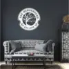 style-19.-Oak-Tree-Couple-2 Dark living room with patterned black-and-white sofa, round family name wall sign reading 'The Hendersons EST. 1995' above, coffee table and decorative cabinet