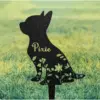 371 Black metal garden stake in a sitting dog silhouette with floral cutouts and the name "Pixie" on grass
