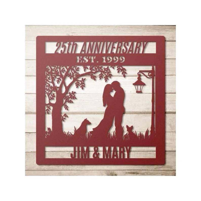 style-37.-Autumn-Dog-Cat-3 Red metal 25th anniversary wall sign reading "25th Anniversary Est. 1999" with silhouetted couple kissing under a tree, two dogs, streetlamp, and names "Jim & Mary"